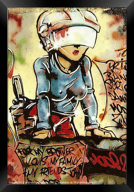 Graffiti Art Of A Woman Warrior Wearing Helmet. Framed Print by Ernest Sampson