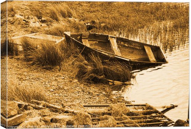 Abandoned rowing boat, Llyn y Glader Canvas Print by Graham Lathbury