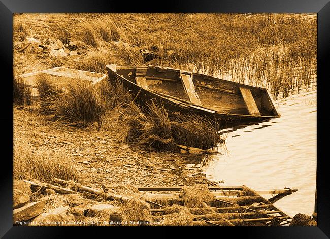 Abandoned rowing boat, Llyn y Glader Framed Print by Graham Lathbury