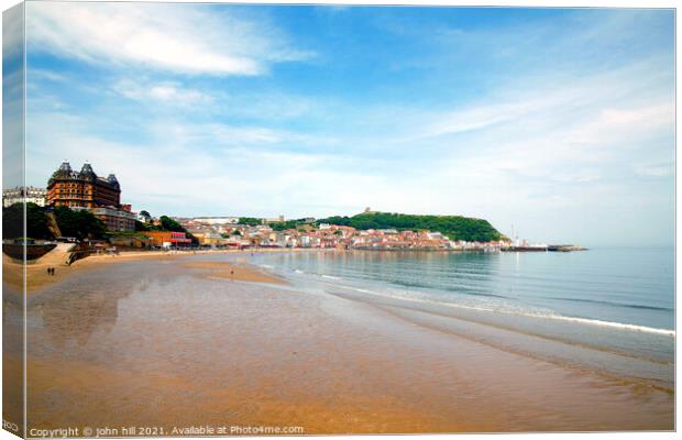 Scarborough at low tide in Yorkshire. Canvas Print by john hill