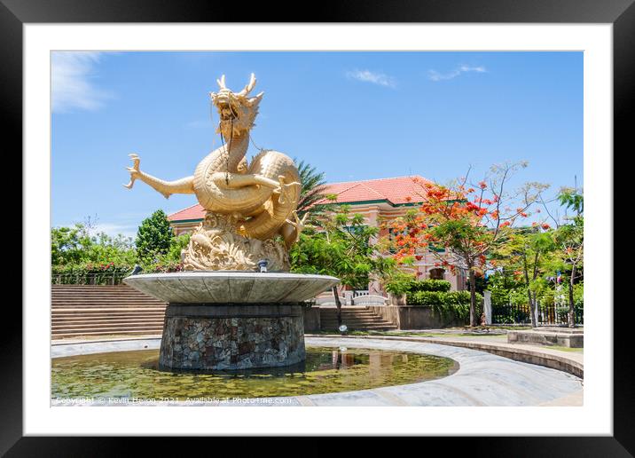 Naga statue and fountain Framed Mounted Print by Kevin Hellon