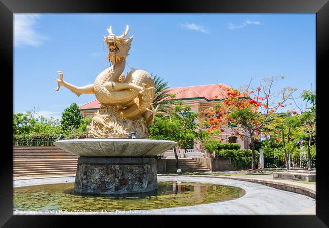 Naga statue and fountain Framed Print by Kevin Hellon