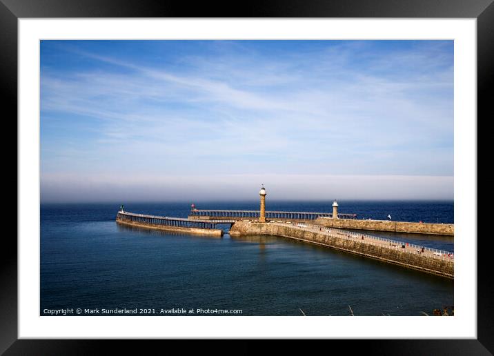 West and East Piers with a Sea Mist Looming at Whitby Framed Mounted Print by Mark Sunderland