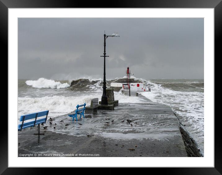 Large waves crashing over the Banjo pier Looe Cornwall Framed Mounted Print by Jim Peters