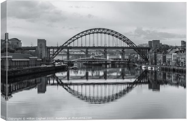 Tyne Bridge mirrored in the River Tyne Canvas Print by Milton Cogheil