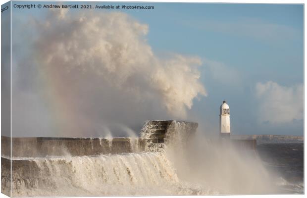 Porthcawl waves smash against the Lighthouse Canvas Print by Andrew Bartlett