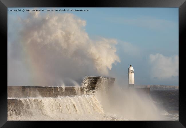 Porthcawl waves smash against the Lighthouse Framed Print by Andrew Bartlett