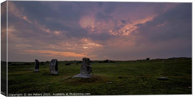 Moody sunset over the hurlers on Bodmin Moor Canvas Print by Jim Peters