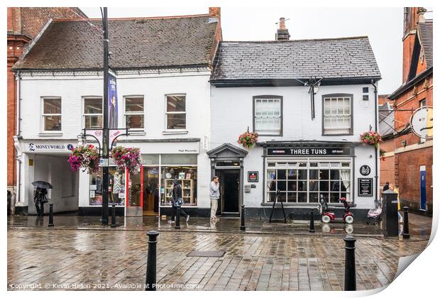 Man stood outside a pub smoking Print by Kevin Hellon