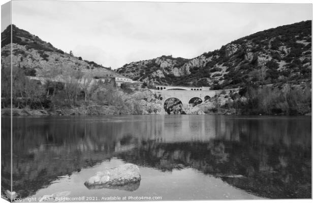 Pont du Diable - Devils Bridge in monochrome Canvas Print by Ann Biddlecombe