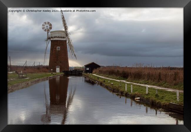Cloudy skies over Horsey Mill Framed Print by Christopher Keeley