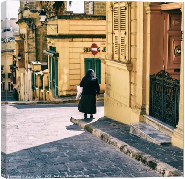 Nun standing by the door at the St. Theresa School Canvas Print by Travel and Pixels 