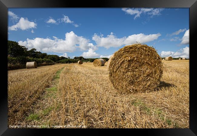 Harvest time hay Bales Framed Print by Jim Peters