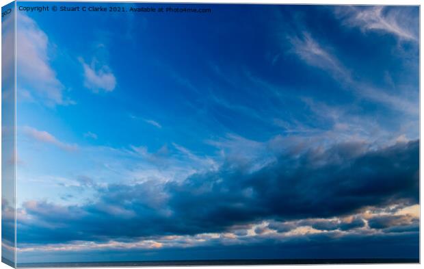 Blue cloudscape Canvas Print by Stuart C Clarke
