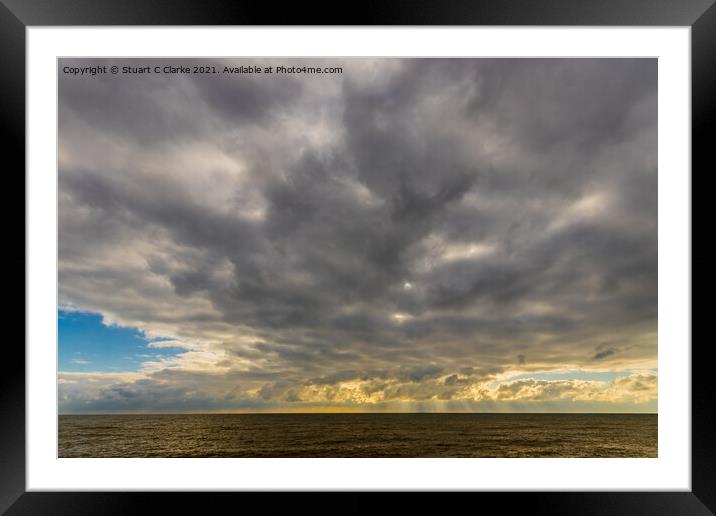 Rays at sea Framed Mounted Print by Stuart C Clarke