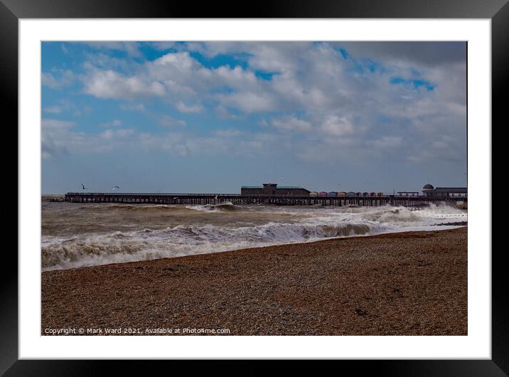 Hastings Pier with a Rough Sea. Framed Mounted Print by Mark Ward