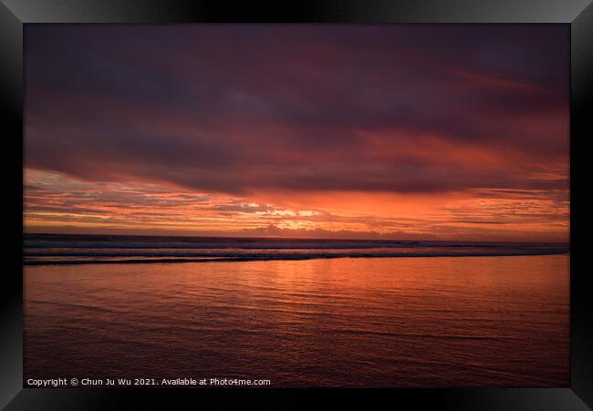 Muriwai Beach at sunset time with colorful clouds, New Zealand Framed Print by Chun Ju Wu