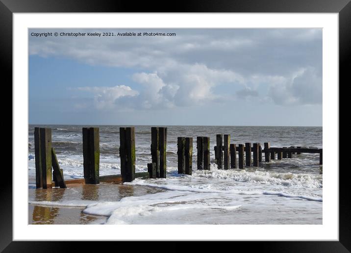 Cloudy skies over Gorleston beach Framed Mounted Print by Christopher Keeley