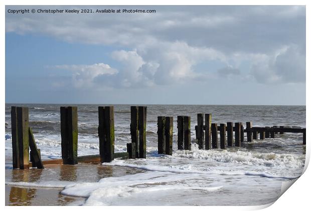 Cloudy skies over Gorleston beach Print by Christopher Keeley