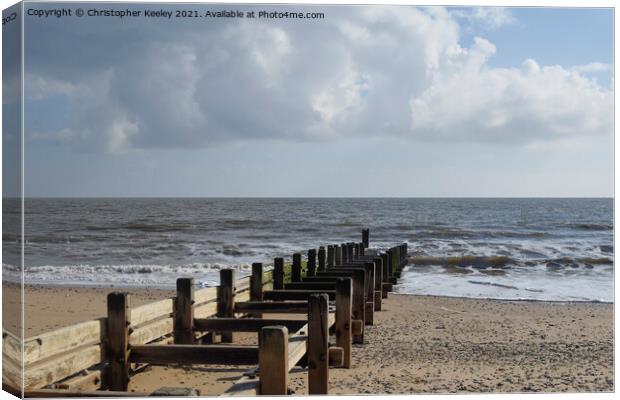 Cloudy skies over Gorleston beach Canvas Print by Christopher Keeley