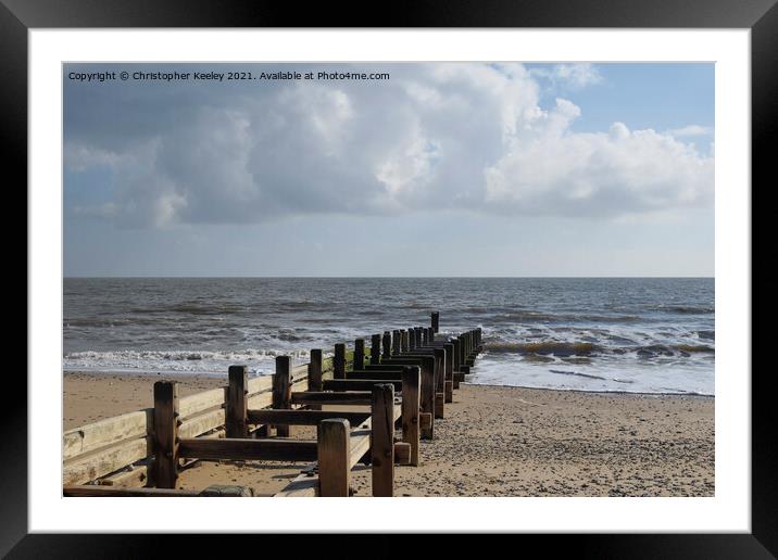 Cloudy skies over Gorleston beach Framed Mounted Print by Christopher Keeley