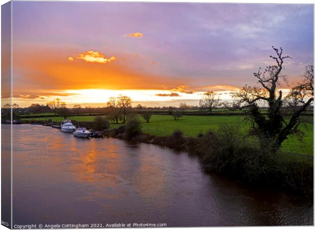 Sunset over the River Ouse Canvas Print by Angela Cottingham