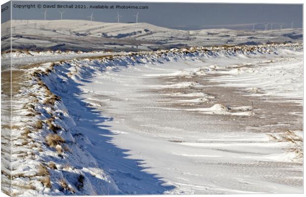 Pennine snowscene at Blackstone Edge. Canvas Print by David Birchall