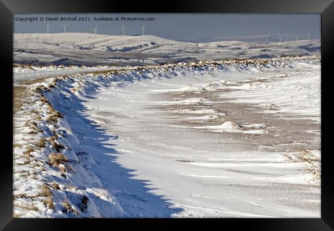 Pennine snowscene at Blackstone Edge. Framed Print by David Birchall