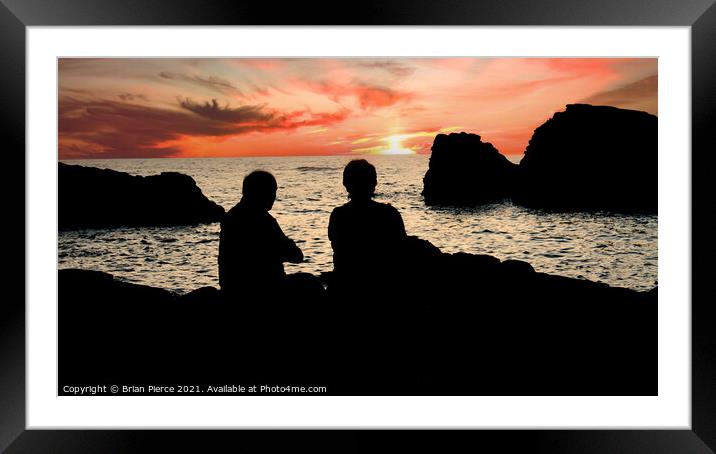 Watching the sun go down Framed Mounted Print by Brian Pierce