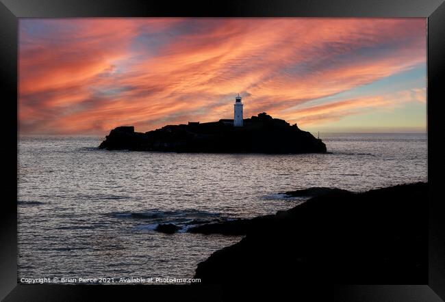 Sunset at Godrevy Lighthouse, St Ives Bay, Cornwal Framed Print by Brian Pierce