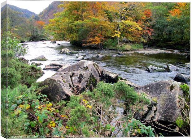 Autumn at Pass of Aberglaslyn in Wales. Canvas Print by john hill