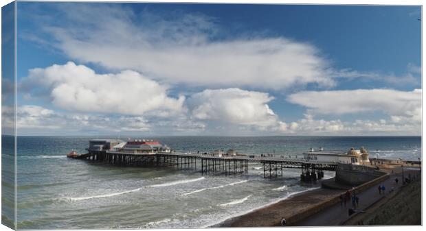 Cromer Pier with lifeboat sun and clouds Canvas Print by mark humpage