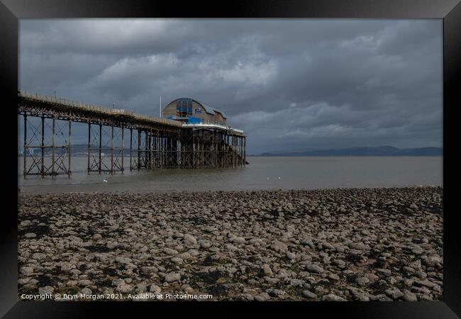 Mumbles pier at low tide Framed Print by Bryn Morgan