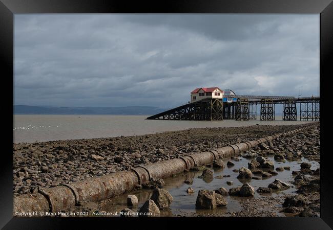 Mumbles pier at low tide Framed Print by Bryn Morgan