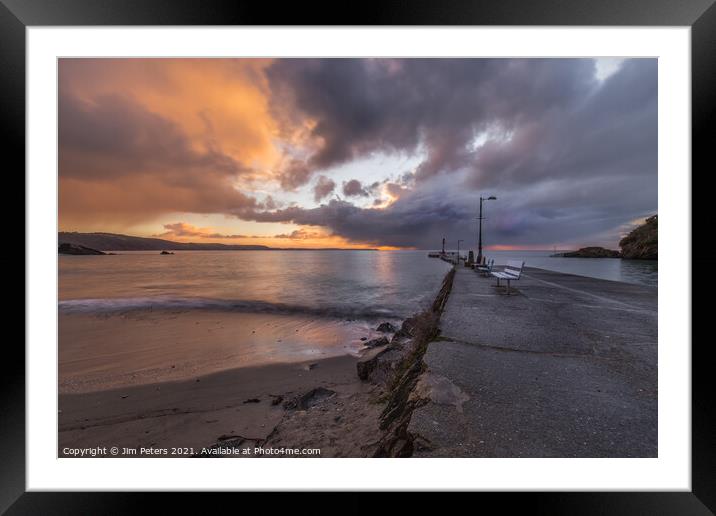 Looe Sunrise with distant rain cloud Framed Mounted Print by Jim Peters