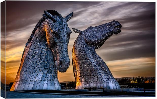 Statues of the Kelpies at Sunset Canvas Print by John Frid