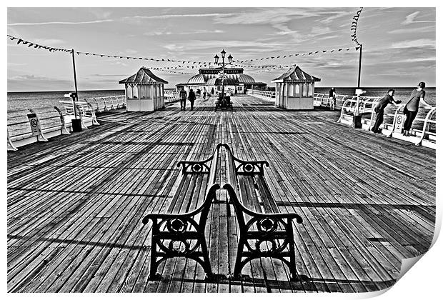 Strolling on Cromer Pier Print by Paul Macro
