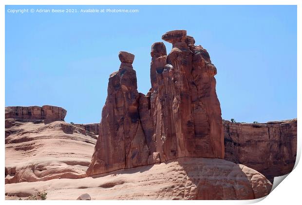 The Sisters Arches National Park Print by Adrian Beese