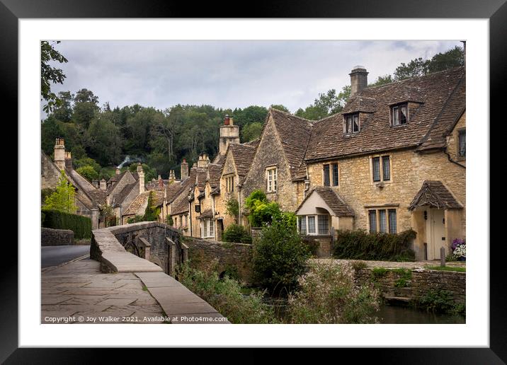Castle Combe village which is in Wiltshire Framed Mounted Print by Joy Walker