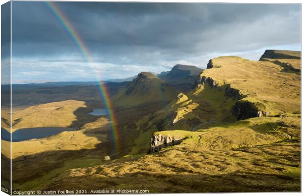 Rainbow over the Trotternish ridge, Isle of Skye Canvas Print by Justin Foulkes