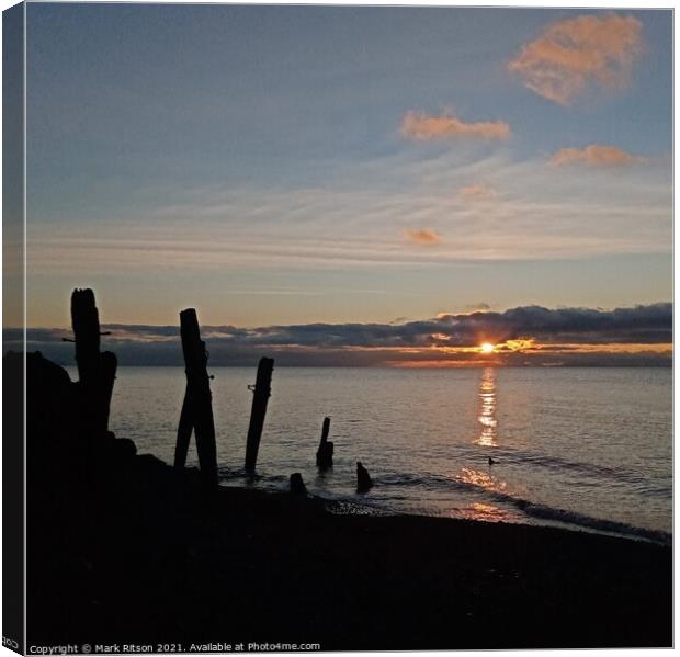 Groyne posts at Sunset Canvas Print by Mark Ritson