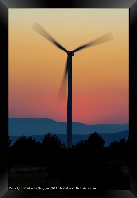 One windmill in motion at sunset Framed Print by Vicente Sargues