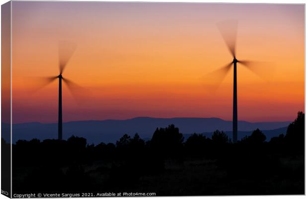 Two windmills in motion at sunset Canvas Print by Vicente Sargues