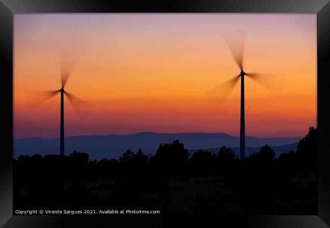 Two windmills in motion at sunset Framed Print by Vicente Sargues
