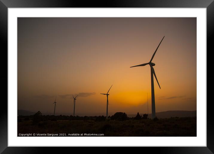 Windmills in a row at golden sunset light Framed Mounted Print by Vicente Sargues