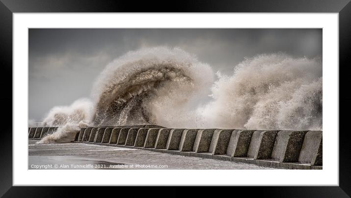 Large waves crashing over sea wall Framed Mounted Print by Alan Tunnicliffe
