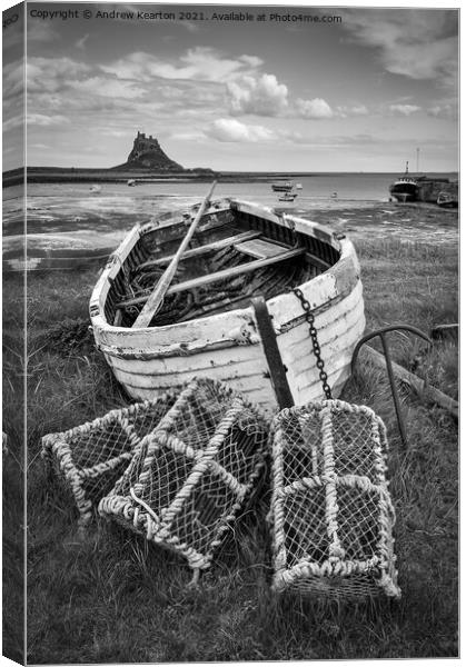 Old boat at Lindisfarne, Northumberland Canvas Print by Andrew Kearton