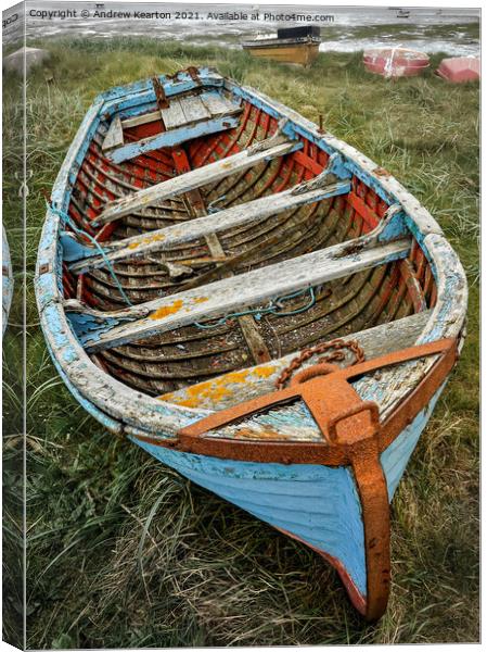 Old boat at Holy Island, Northumberland Canvas Print by Andrew Kearton