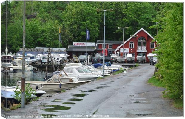 small  boats are docked in Kristiansand, Norway, Canvas Print by Anish Punchayil Sukumaran