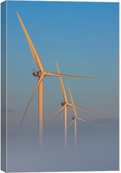 Three Wind Turbines in the Mist Canvas Print by Arterra 